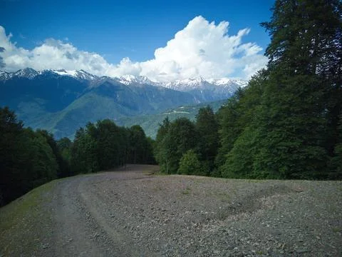Road among the mountains Stock Photos