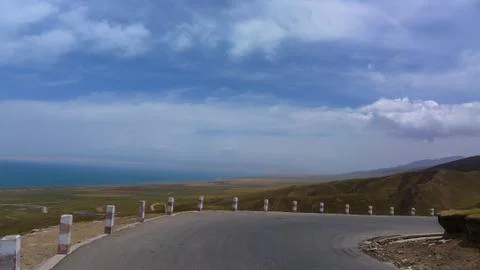Road and a Boundless Plain under the Blue Sky Stock Photos