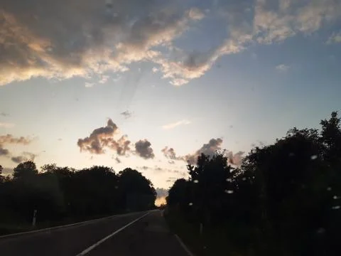 Road and Clouds Stock Photos