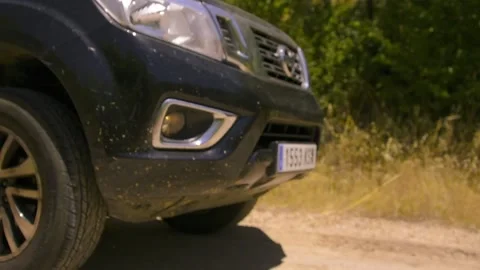 Off-road and moving caravan set passing near the camera Stock Footage 140380543