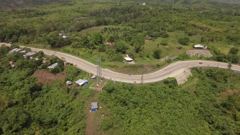 Road and Power Lines through Rural Puerto Princesa in Palawan 스톡 동영상 347182541