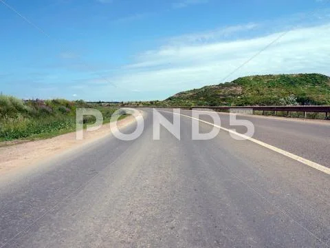 Road and sky at summer Stock Photos