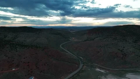 Road And Sloping Mountains During Dusk In Parowan Gap, Iron County, Utah, Stock Footage 231121732