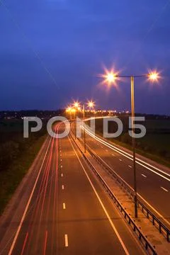 Road and traffic at night Stock Photos