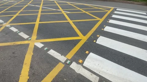 Road asphalt texture lines yellow cross pattern Video stock 320099810
