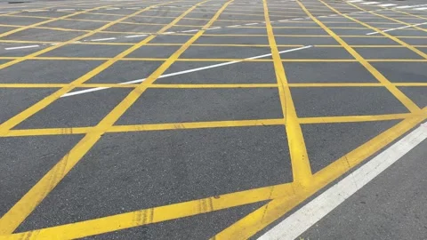 Road asphalt texture lines yellow cross pattern Stock Footage 320099828