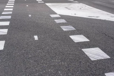 Road asphalt texture with separation lines Stock Photos