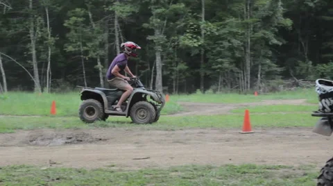 Off Road ATV Instructor Demonstrates The Course Stock Footage 56623236