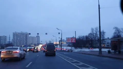 The Road On The Background Of The Traffic Stream. Evening Night Time. Time L 9 Stock Footage 230195435