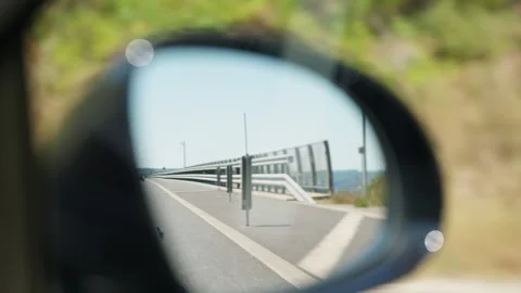 Road Barrier Reflected in Car Side Mirror Slow Motion Видео 346216578