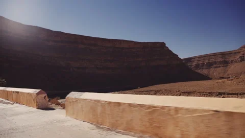 Road Barriers With Mountains In Desert Stock Footage 146103402
