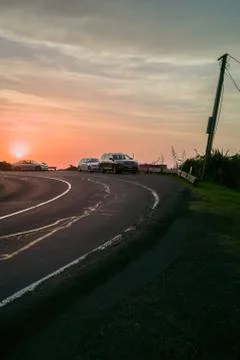 Road bend in sunset light Stock Photos