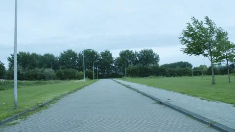 Road In Between A Field Of Grass Video stock 247142714