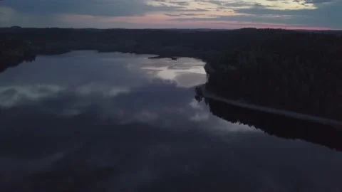 The road between the forest and the lake. Stock Footage 149108284