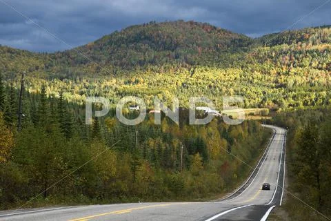 Road between Les Eboulements and Saint-Hilarion, Quebec, Canada. Stock Photos