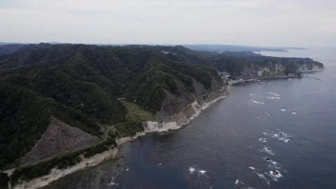 A road between the mountains and the sea 002 Stock Footage 319907570