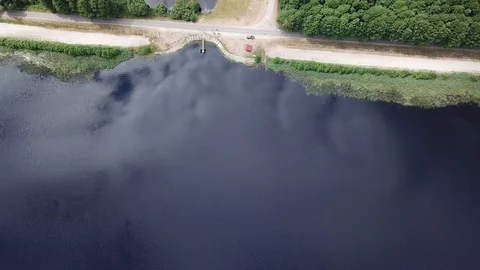 The road between the river and the forest Stock Footage 91373915