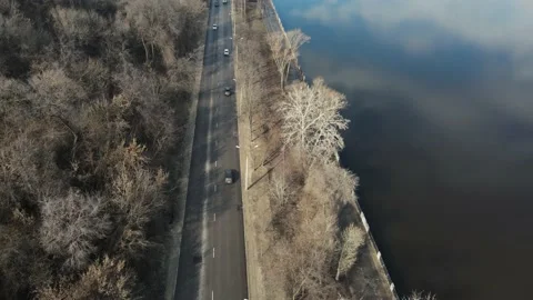 Road between the river and the forest. aerial shooting Stock Footage 151861361
