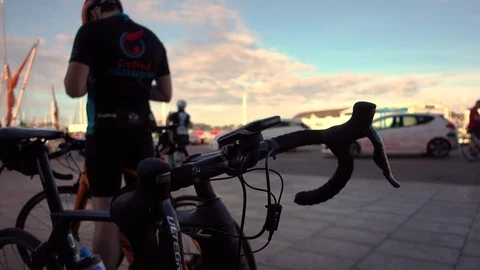 Road bicycle close up while the sun rises in the background Stock Footage 71994091