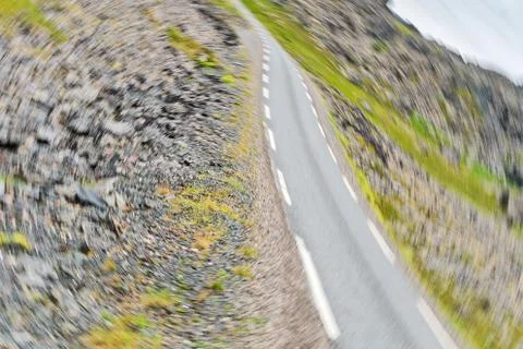Road is blurred by the movement of the camera Stock Photos