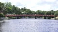 Road Bridge With Cars Driving Spans River In Florida 4k or 4k+ Resolution