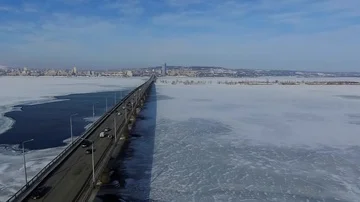 Road bridge over the ice river Video stock 85837826