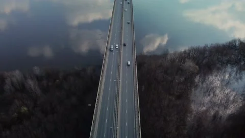 A road bridge over the river, taken from a quadrocopter. Stock Footage 239849463