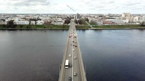 Road bridge over the river with a view of the city center Stock Footage 163879795