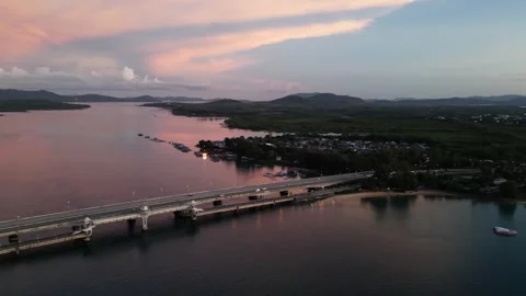 Road bridge over sea strait during sunset. Video from drone Stock Footage 305078985