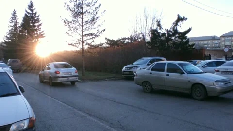 Road with a bright sun at the end of the path, at the golden hour Stock Footage 219992089