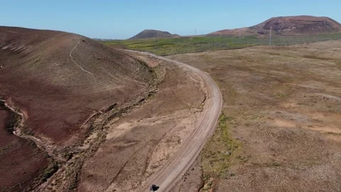 Off road buggies on desert road Stock Footage 238771770