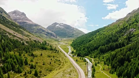 Road to the cable car station of the Morteratsch glacier in Switzerland (aerial) Stock Footage