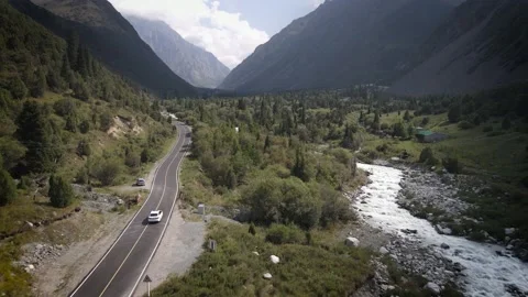 Road with car in high mountains. Video stock 209931286