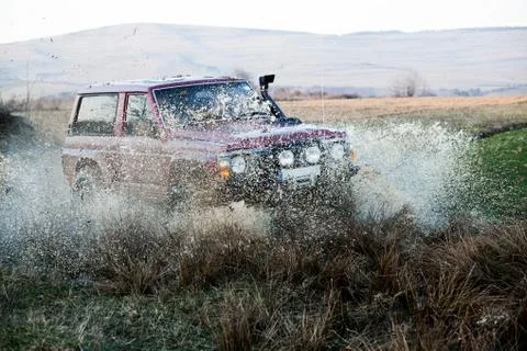 Off road car in mud Stock Photos
