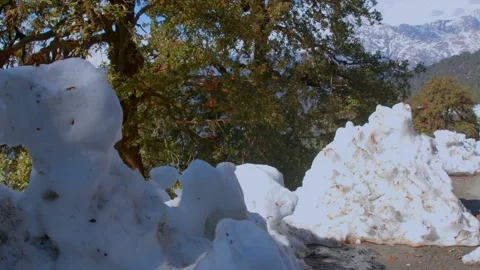 Road carved between snow mountains in uttrakhand india Stock Footage 324777832