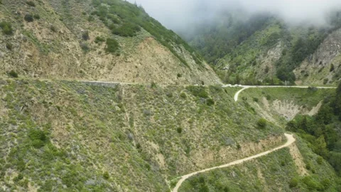 Road on cliff of large mountain Stock Footage 155464086