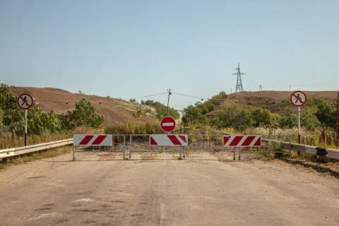 Road closed. Access is closed, Stop sign close view. Stock Photos