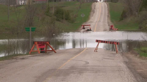 Road closed and flooding after heavy thunder storm Stock Footage 38348479