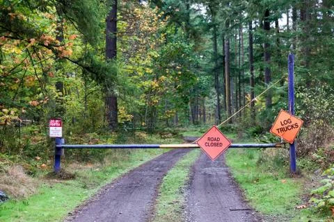 Road closed do not enter log trucks signs Stock Photos