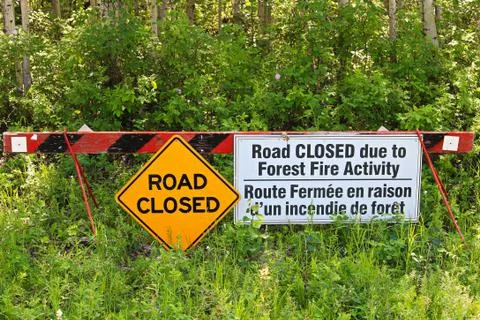 A road closed due to fire activity sign Stock Photos