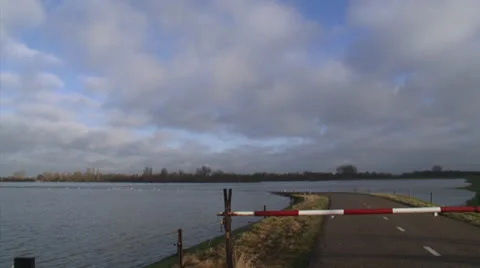 Road closed due to flooded river ijssel + pan inundated agricultural field Stock Footage 23729159