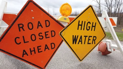 Road closed high water temporary signs close up Video stock 126944037
