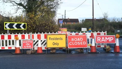 Road closed resident access only on country road at building works uk Stock Footage 125240356