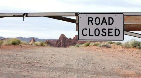 Road Closed Sign in Mountain Area Stock Footage