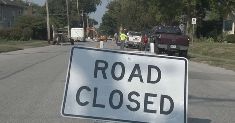 Road Closed Sign - Worker Walking to Job Site Stock Footage 79937490