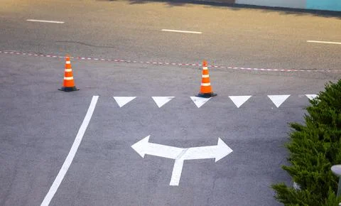 Road closure setup with safety cones and dividing lines Stock Photos