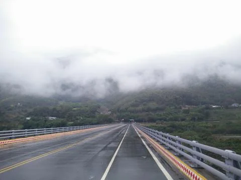 A road with clouds and mist Foto stock