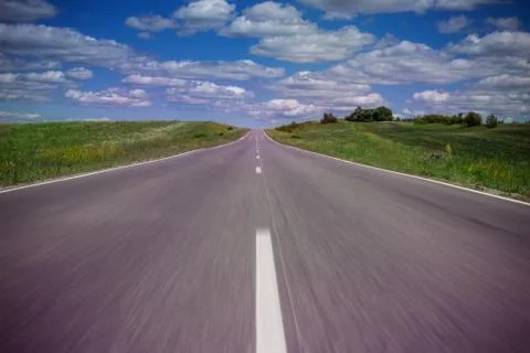 Road in the clouds Stock Photos