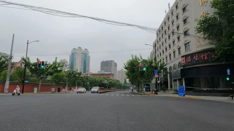 Road conditions in a modern cloudy environment in Shanghai under lockdown Stock Footage 195971585