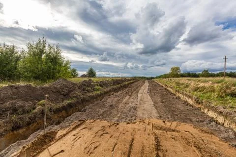 Road Construction and empty road with sand Stock Photos